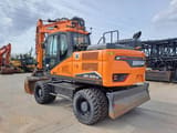 2023 Doosan DX160W-7 wheel excavator, rear three-quarter view