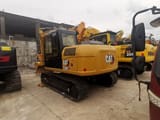 2021 Caterpillar 313D2 GC crawler excavator, rear three-quarter view