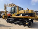 2024 Caterpillar 320CL paletli ekskavatör, yandan profil görünüm
