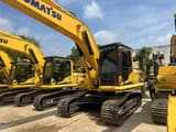 2024 Komatsu PC200 crawler excavator, front three-quarter view