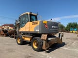 2011 Volvo EW140C wheel excavator, rear three-quarter view