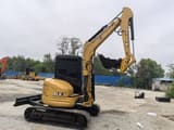 2022 Caterpillar 303.5E mini excavator, side profile view