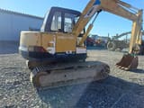 Kobelco SK60 mini excavator, rear three-quarter view
