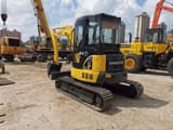 2020 Komatsu PC55MR mini excavator, front three-quarter view