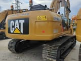2017 Caterpillar 323D crawler excavator, rear three-quarter view