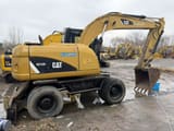 2022 Caterpillar M315D2 wheel excavator side view