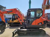 2018 Doosan DX60 crawler excavator, side view