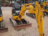 2023 Komatsu PC16R-3HS mini excavator, front three-quarter view