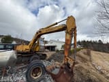 1985 Mitsubishi MS120-2 excavator side view
