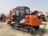 2024 Hitachi ZX70 crawler excavator, rear three-quarter view