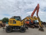 2018 Komatsu PW118MR-11W wheel excavator, side profile view