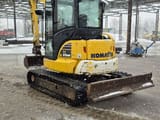 2021 Komatsu PC55MR-5 mini excavator, rear three-quarter view