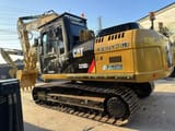Caterpillar 320D2 rupsgraafmachine uit 2015, zijaanzicht