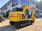 2024 Komatsu PC70 crawler excavator, rear three-quarter view