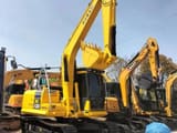 Komatsu PC130 crawler excavator, side view