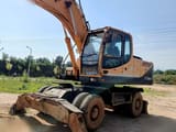 2010 Hyundai Robex 265W-9 wheel excavator, side view