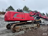 2014 Liebherr R922 crawler excavator, rear three-quarter view