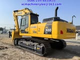 2024 Komatsu PC300LC crawler excavator, rear three-quarter view