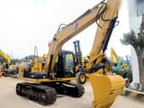 2022 Caterpillar 313D2 GC crawler excavator, side view
