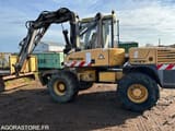 2002 Mecalac 12MXT wheel excavator, side view