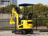 2026 Kubota R319 mini excavator, rear three-quarter view