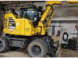 2023 Komatsu PW138MR wheel excavator, side profile view