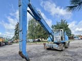1999 Fuchs MHL340 material handler, side view