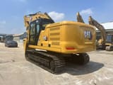 2024 Caterpillar 320GC crawler excavator, rear three-quarter view