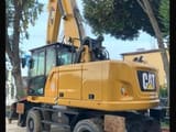 2018 Caterpillar MH3022 material handler, rear three-quarter view
