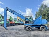 1999 Fuchs MHL340 material handler, side view