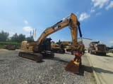 2017 Caterpillar 323FL crawler excavator, side view