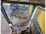 1992 Komatsu PC210LC crawler excavator operator cab interior view