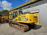 2015 Komatsu HB215LC-2 crawler excavator, rear three-quarter view