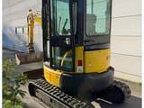 2017 Komatsu PC26MR-3 mini excavator, rear three-quarter view