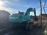 2005 Kobelco SK250 NLC-6ES crawler excavator, rear three-quarter view
