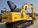 2024 Komatsu PC210 crawler excavator, rear three-quarter view
