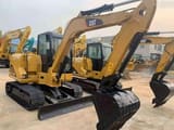 2023 Caterpillar 306D mini excavator, front three-quarter view
