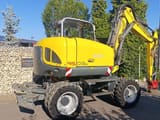 2013 Wacker Neuson 9503 wheel excavator, rear three-quarter view