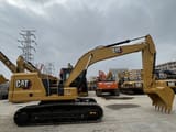 2023 Caterpillar 320GC crawler excavator, side profile view