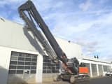 2021 Hitachi KMC500 S-6 demolition excavator, side view with extended boom