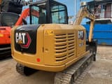 2018 Caterpillar 305.5E2 crawler excavator, rear three-quarter view