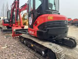 2024 Kubota U55-4 mini excavator, front three-quarter view