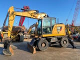 2018 Caterpillar M315F wheel excavator, side profile view