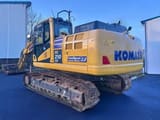 2022 Komatsu PC210LCI-11E0 crawler excavator, rear three-quarter view