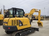 2023 Komatsu PC56 mini excavator, rear three-quarter view