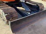 Hitachi ZX75US crawler excavator, front view of blade and tracks