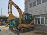 2013 Caterpillar 306D crawler excavator, side view
