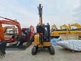 2023 Caterpillar 303.5E mini excavator, rear view
