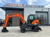2018 Doosan DX60 wheel excavator, side profile view
