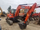 Doosan DX60 crawler excavator, side view